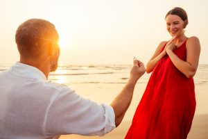 happy couple after an engagement on the beach. They get premarital counseling in Bradenton, FL at forever free counseling 34203