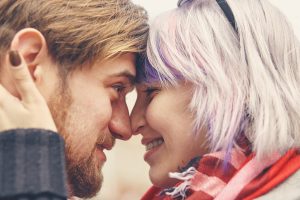 happy couple looks at each other lovingly after sex therapy in bradenton, FL with a sex therapist at Forever Free Counseling